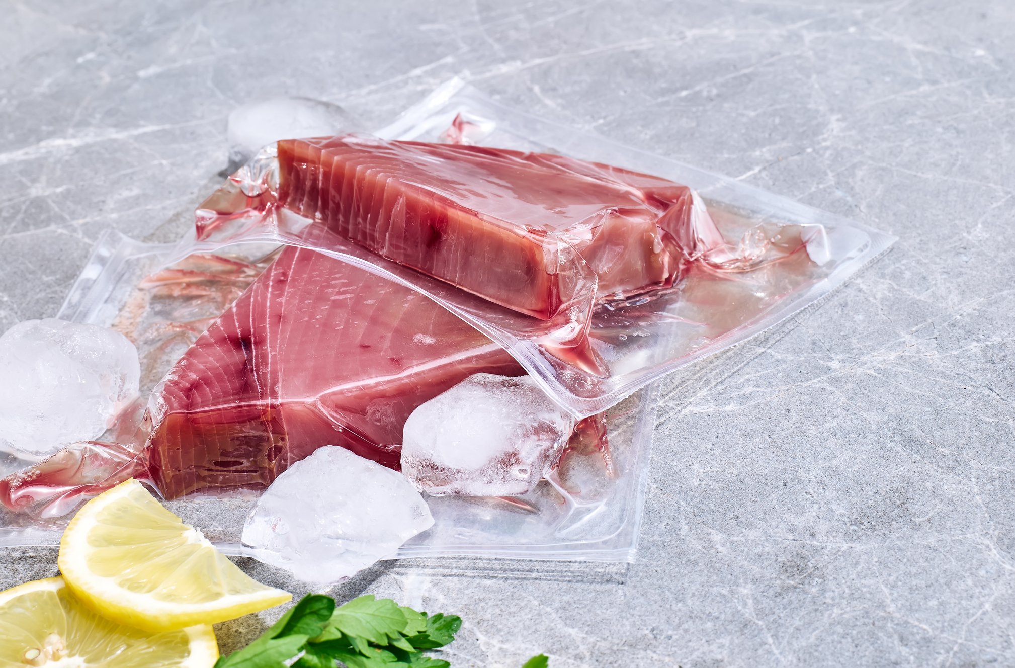 red-tuna-fillets-in-vacuum-package-on-gray-marble-2023-11-27-05-02-32-utc red-tuna-fillets-in-vacuum-package-on-gray-marble-2023-11-27-05-02-32-utc